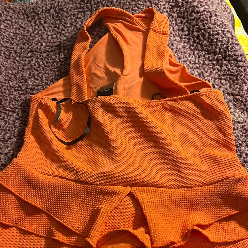 Coral/orange top
